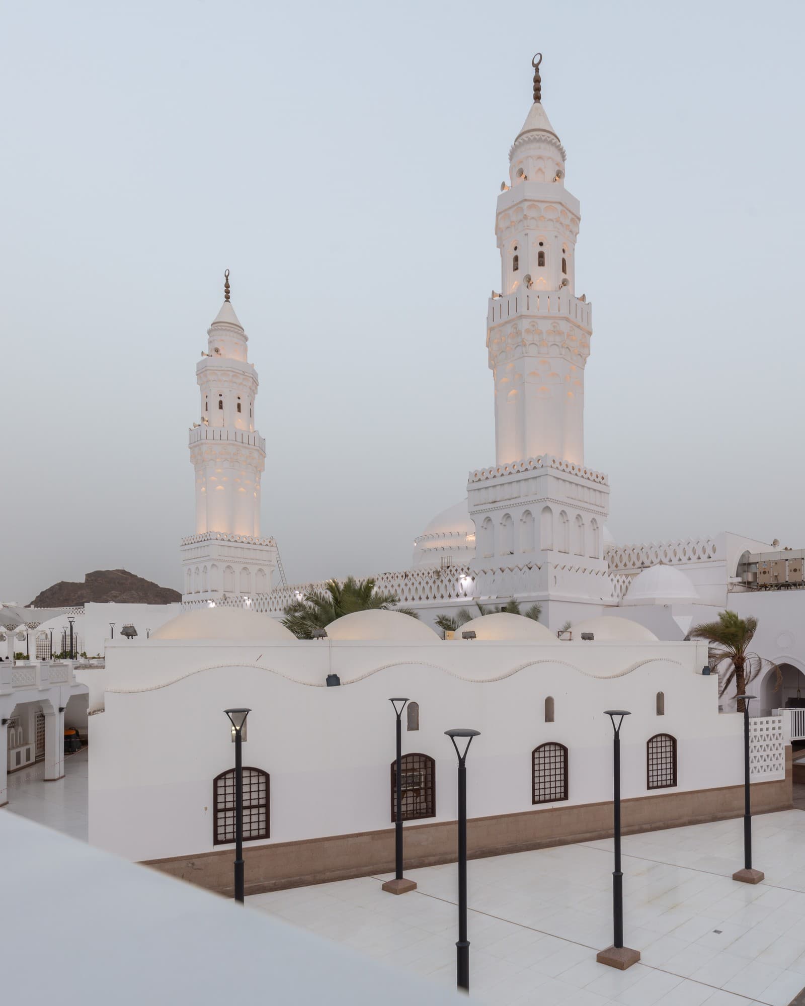 Masjid al-Qiblatayn, with its two white minarets above the courtyard